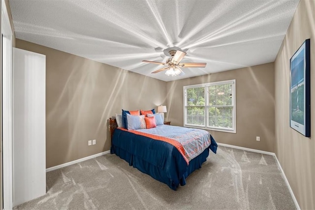 7007 Bell Rd, Shawnee, KS 66217 - bedroom with carpet flooring, baseboards, ceiling fan, and a textured ceiling