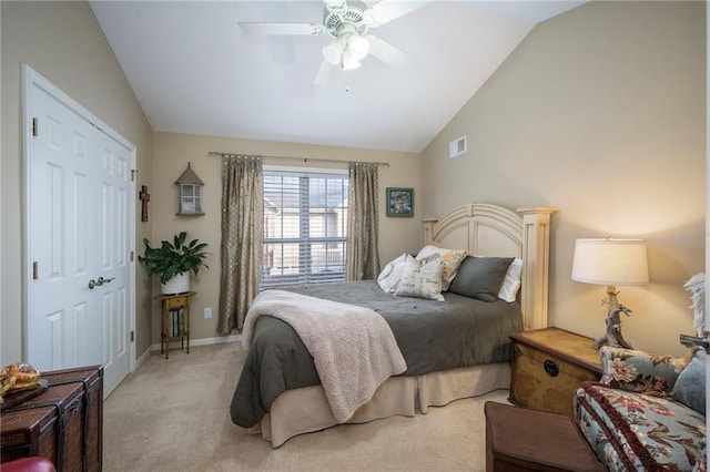 15141 S Symphony Dr Unit 1300, Olathe, KS 66062 - bedroom with lofted ceiling, light colored carpet, a ceiling fan, and baseboards