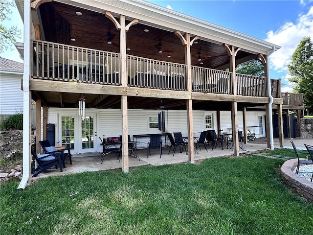 14409 Tillman Rd, Smithville, MO 64089 - back of house with a lawn, a patio area, and ceiling fan