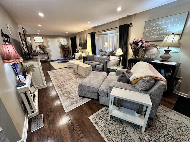 14409 Tillman Rd, Smithville, MO 64089 - living room featuring dark wood-style floors, recessed lighting, and baseboards