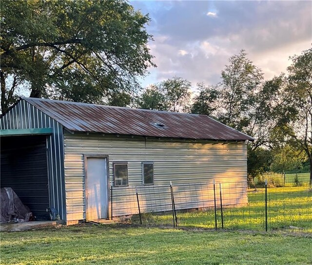 1596 Haskell Rd, Williamsburg, KS 66095 - view of side of home with an outdoor structure and metal roof