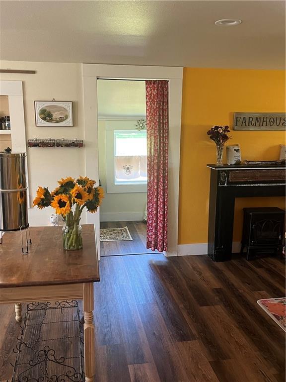 1596 Haskell Rd, Williamsburg, KS 66095 - entryway with dark wood-style flooring and baseboards