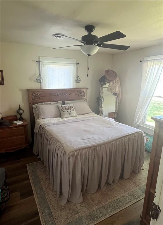 1596 Haskell Rd, Williamsburg, KS 66095 - bedroom featuring wood finished floors and a ceiling fan