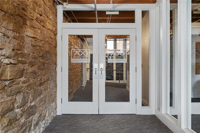 700 Broadway Blvd Unit 210, Kansas City, MO 64105 - entrance to property with french doors and stone siding