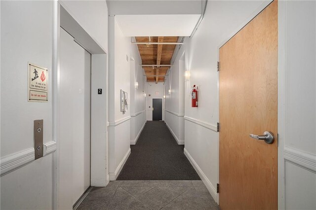 700 Broadway Blvd Unit 210, Kansas City, MO 64105 - hallway with tile patterned flooring