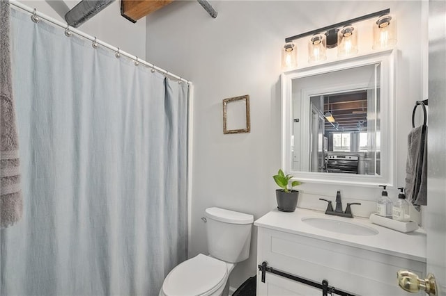 700 Broadway Blvd Unit 210, Kansas City, MO 64105 - full bathroom featuring toilet, vanity, and a shower with curtain