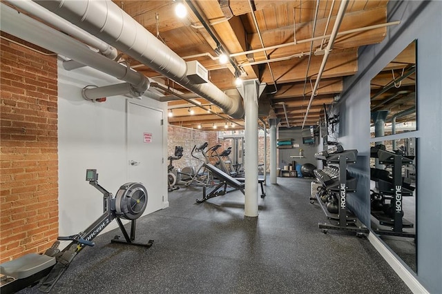 700 Broadway Blvd Unit 210, Kansas City, MO 64105 - exercise area featuring brick wall