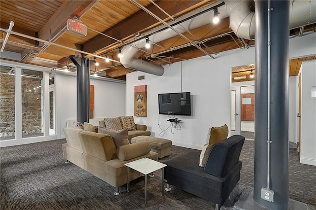 700 Broadway Blvd Unit 210, Kansas City, MO 64105 - carpeted living area featuring baseboards