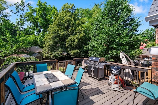 16011 W 149th Ter, Olathe, KS 66062 - wooden terrace with area for grilling and outdoor dining area
