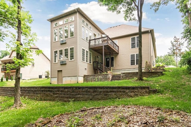 906 Cheatham Ct, Warrensburg, MO 64093 - rear view of property with a yard and a wooden deck