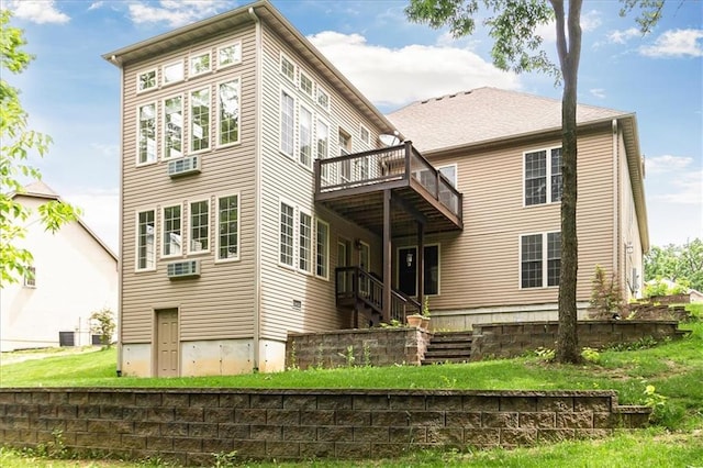 906 Cheatham Ct, Warrensburg, MO 64093 - rear view of property featuring a wooden deck, a lawn, and stairway