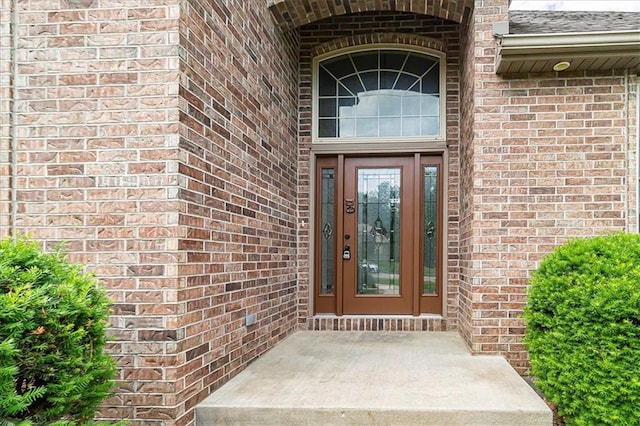 906 Cheatham Ct, Warrensburg, MO 64093 - view of exterior entry with brick siding