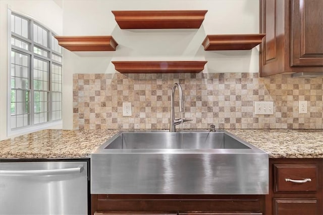 906 Cheatham Ct, Warrensburg, MO 64093 - kitchen featuring dishwasher, a sink, open shelves, decorative backsplash, and healthy amount of natural light