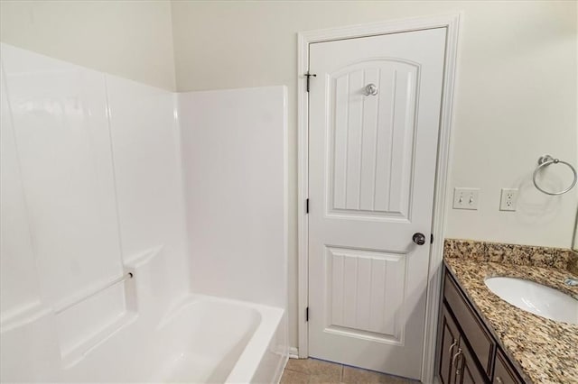 906 Cheatham Ct, Warrensburg, MO 64093 - bathroom with vanity, tub / shower combination, and tile patterned floors