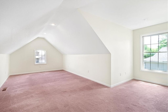 906 Cheatham Ct, Warrensburg, MO 64093 - bonus room featuring carpet floors, baseboards, and vaulted ceiling