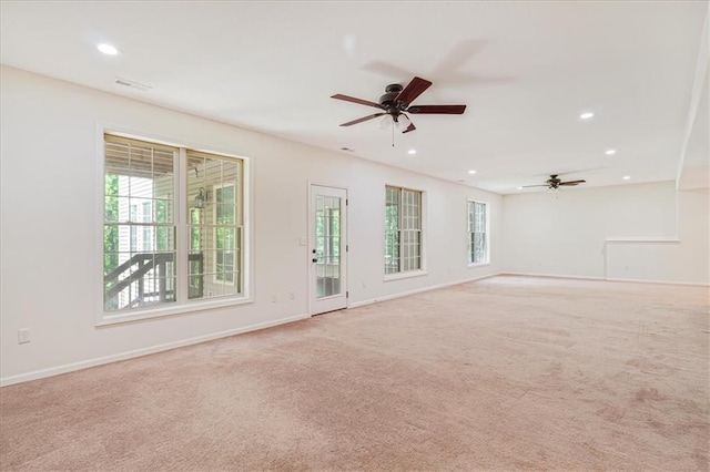 906 Cheatham Ct, Warrensburg, MO 64093 - spare room featuring plenty of natural light, ceiling fan, recessed lighting, light carpet, and baseboards