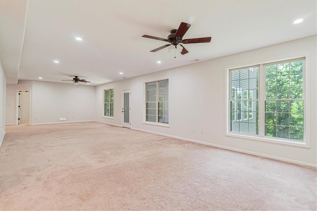 906 Cheatham Ct, Warrensburg, MO 64093 - empty room featuring ceiling fan, baseboards, recessed lighting, and light carpet