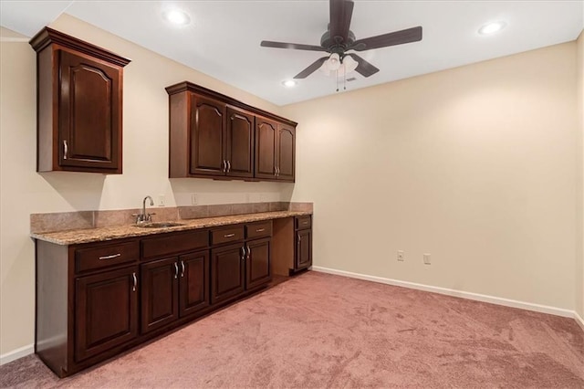 906 Cheatham Ct, Warrensburg, MO 64093 - bar featuring a sink, ceiling fan, light carpet, baseboards, and recessed lighting