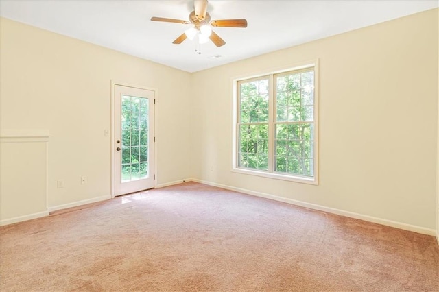 906 Cheatham Ct, Warrensburg, MO 64093 - unfurnished room with carpet flooring, ceiling fan, and baseboards