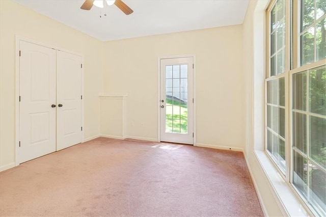 906 Cheatham Ct, Warrensburg, MO 64093 - unfurnished bedroom featuring carpet flooring, access to outside, baseboards, ceiling fan, and a closet