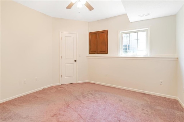 906 Cheatham Ct, Warrensburg, MO 64093 - unfurnished room featuring light carpet, ceiling fan, and baseboards