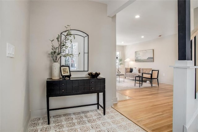 4804 Jarboe St, Kansas City, MO 64112 - hall with recessed lighting, baseboards, and wood finished floors