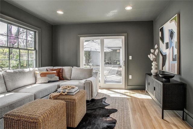4804 Jarboe St, Kansas City, MO 64112 - living area with light wood-style floors and recessed lighting