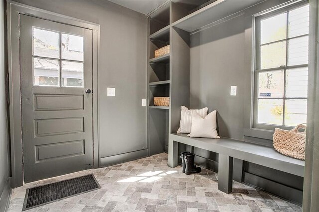 4804 Jarboe St, Kansas City, MO 64112 - mudroom featuring brick patterned floors