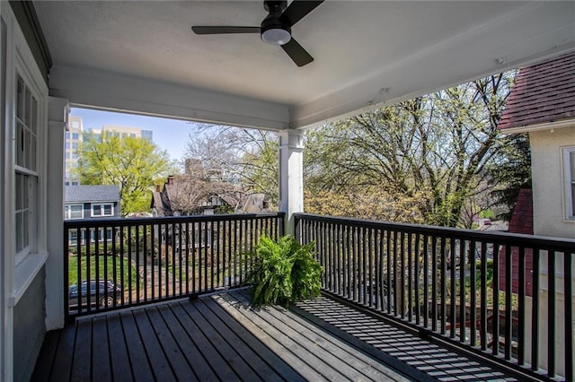 4804 Jarboe St, Kansas City, MO 64112 - deck featuring a ceiling fan