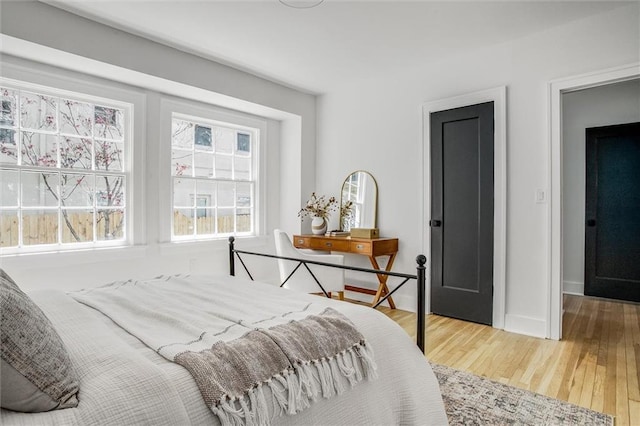 4804 Jarboe St, Kansas City, MO 64112 - bedroom with wood finished floors and baseboards