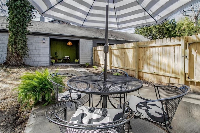 4804 Jarboe St, Kansas City, MO 64112 - view of patio with outdoor dining area