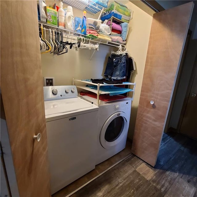 1525 Duncan St, Saint Joseph, MO 64503 - laundry room with separate washer and dryer and wood finished floors