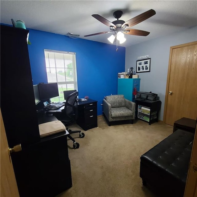 1525 Duncan St, Saint Joseph, MO 64503 - home office with ceiling fan and carpet flooring