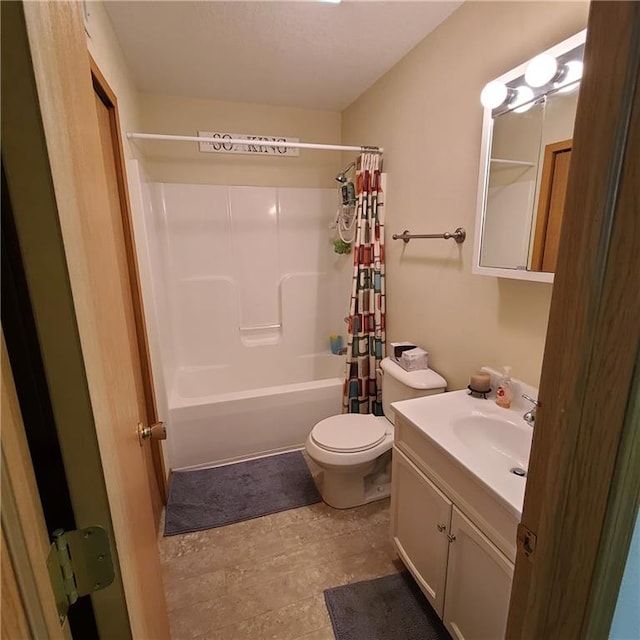 1525 Duncan St, Saint Joseph, MO 64503 - bathroom featuring vanity, toilet, and shower / bath combination with curtain