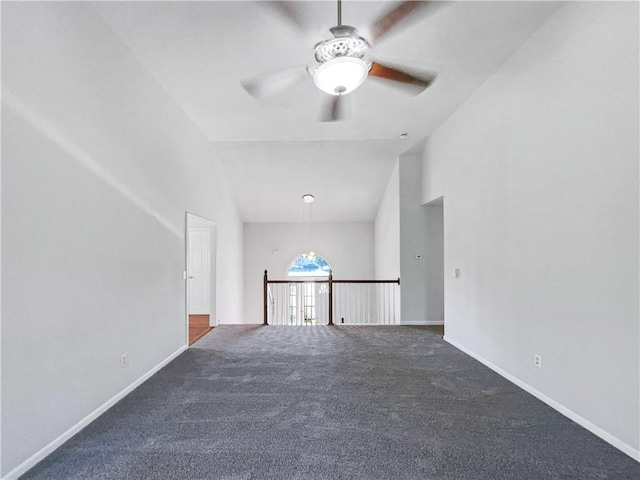18100 E 11th Terrace Ct N, Independence, MO 64056 - unfurnished room featuring ceiling fan, carpet, baseboards, and high vaulted ceiling