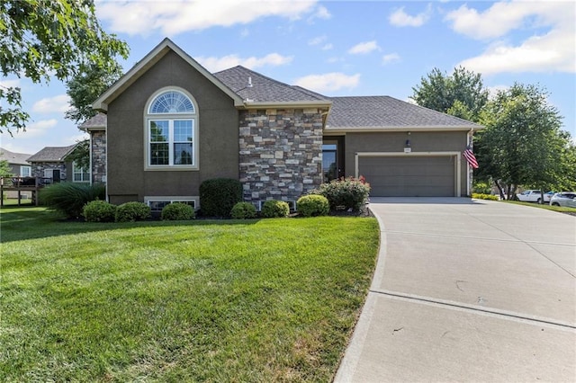 16904 S Bradley Dr, Olathe, KS 66062 - view of front facade featuring driveway, stucco siding, a front lawn, an attached garage, and stone siding