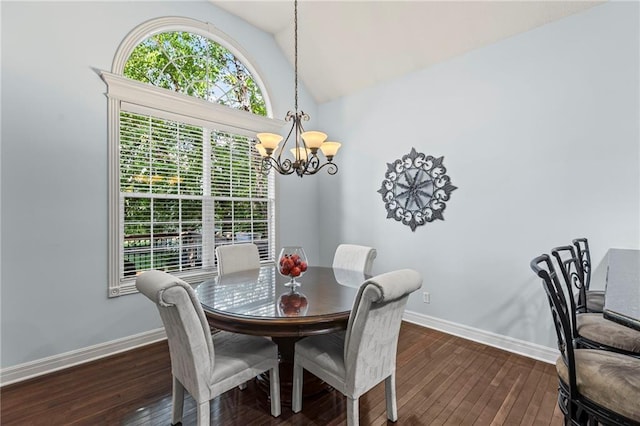 16904 S Bradley Dr, Olathe, KS 66062 - dining room featuring a chandelier, dark wood-style flooring, and high vaulted ceiling
