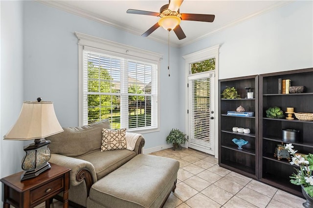 16904 S Bradley Dr, Olathe, KS 66062 - living area with light tile patterned flooring, a ceiling fan, and ornamental molding