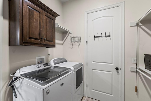 16904 S Bradley Dr, Olathe, KS 66062 - washroom with washing machine and dryer and cabinet space