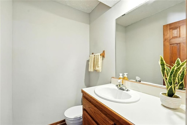 8025 Woodstone St, Lenexa, KS 66219 - bathroom featuring vanity and toilet