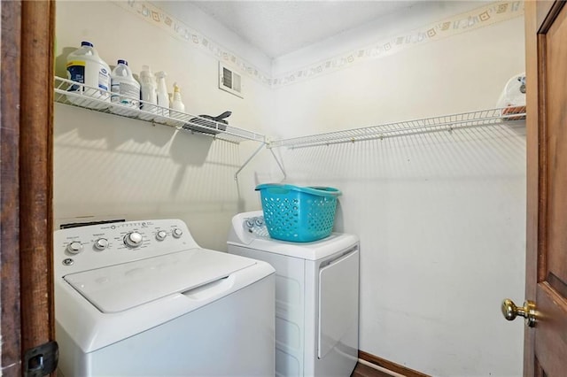 8025 Woodstone St, Lenexa, KS 66219 - laundry room with washer and dryer