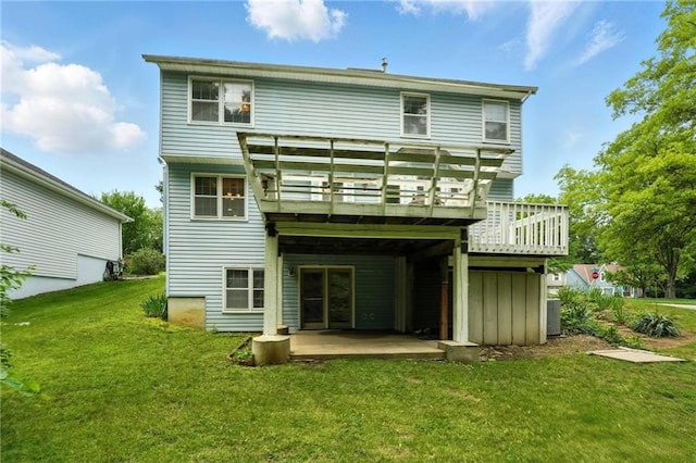 8025 Woodstone St, Lenexa, KS 66219 - back of house with a lawn, a deck, and a patio area