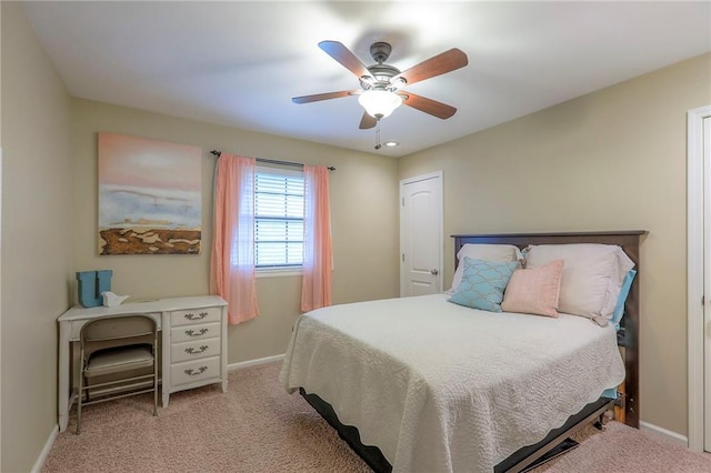 15005 W 94th St, Lenexa, KS 66215 - carpeted bedroom featuring baseboards and a ceiling fan