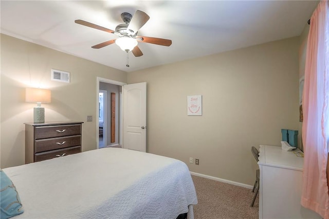 15005 W 94th St, Lenexa, KS 66215 - carpeted bedroom with baseboards and ceiling fan