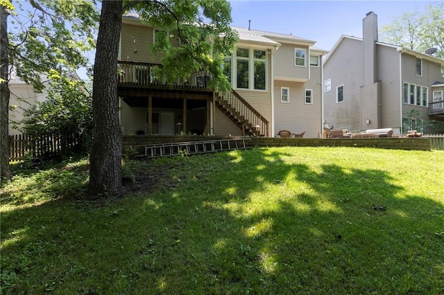 7642 N Atkins Pl, Kansas City, MO 64152 - back of house featuring stairs and a wooden deck