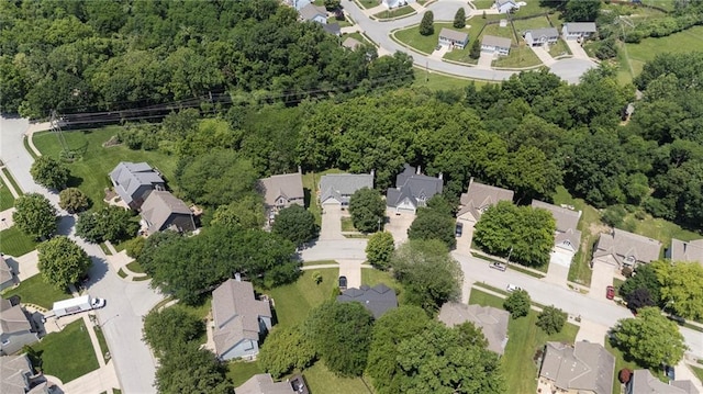 7642 N Atkins Pl, Kansas City, MO 64152 - aerial view of property and surrounding area with nearby suburban area