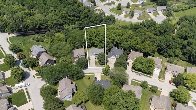 7642 N Atkins Pl, Kansas City, MO 64152 - aerial perspective of suburban area with property boundaries highlighted