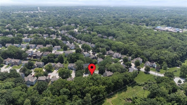 7642 N Atkins Pl, Kansas City, MO 64152 - drone / aerial view of a heavily wooded area
