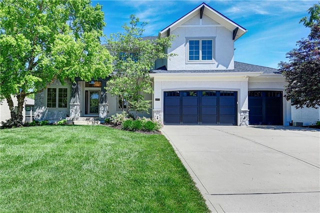 16821 Goddard St, Overland Park, KS 66221 - view of front of home with stucco siding, stone siding, and a front lawn