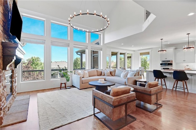 16821 Goddard St, Overland Park, KS 66221 - living area featuring light wood-style flooring and recessed lighting